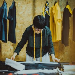 Cutting out a sewing pattern